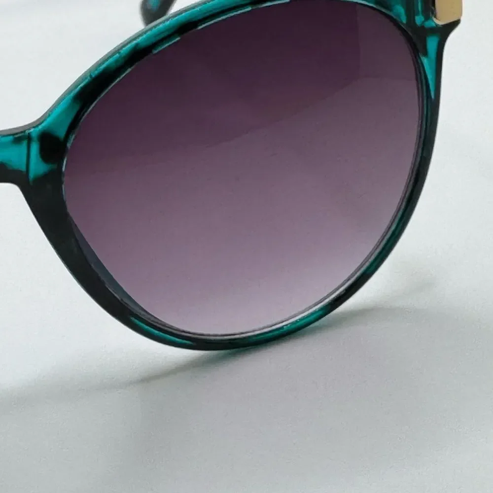 Stylish Teal Green Tortoise Shell Sunglasses with Gradient Purple Lens